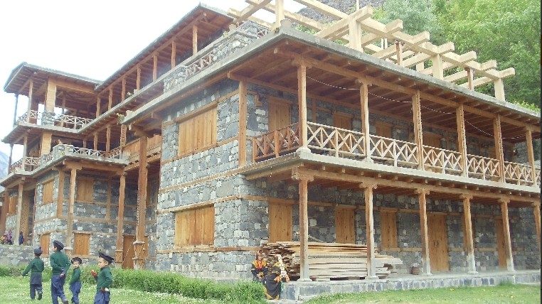 A typical Kalash dwelling for the tribal elders. Compared to the mud huts and fetid squalor of their neighbors, these homes often have a simple bathing room within to promote health and cleanliness.